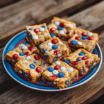 4th of July Cake-Mix Cookie Bars: A Festive Treat for Your Celebration 2 4th of July Cake-Mix Cookie Bars on a picnic table