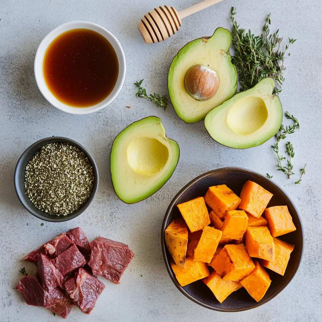 Hot honey sweet potato beef bowl with avocado and hot honey drizzle.