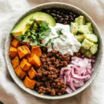Sweet Potato Beef Taco Bowls with vibrant toppings